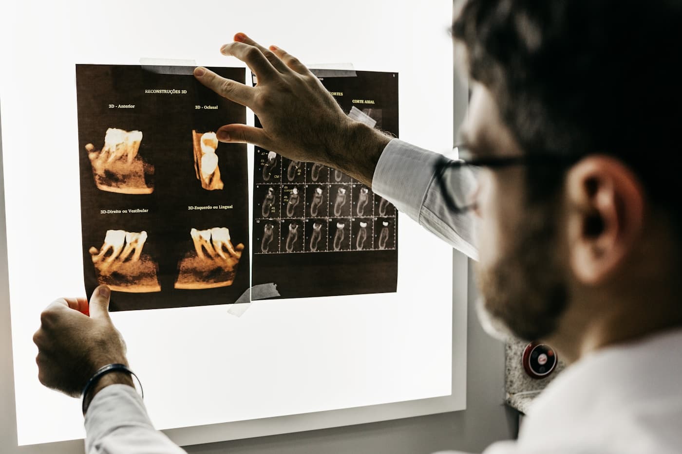 Medical professional reviewing patient checks and reports